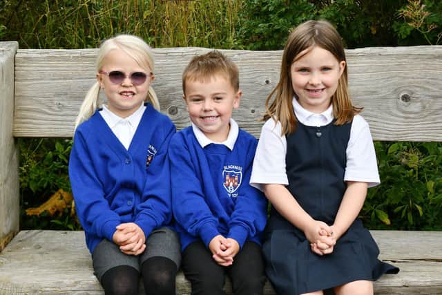 This trio started at Blackness Primary last August but as a question mark hangs over the school's future there many not be many more new starts. Pic: Michael Gillen