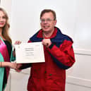 Romany Shaw, Miss Teen Stirlingshire presents Richard Hadlow with his Local Hero Award. Pic: Michael Gillen