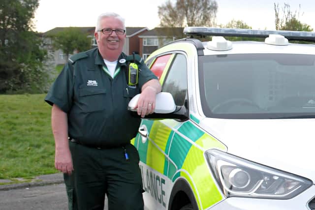 Paramedic Rod Moore helped so many people during his long career with the Scottish Ambulance Service and even took the time to praise other people's live saving efforts as he did here back in April - applauding Stenhousemuir's Day Today store after a defibrillator was installed. Picture: Michael Gillen.