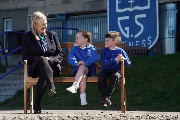 Brooke & Jason of Grange Primary School with Catherine Coleman of Miller Homes on the new Buddy Bench.  (Pic: Stewart Attwood)