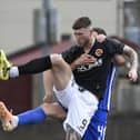Matty Aitken looks to direct the ball goalward against St Johnstone