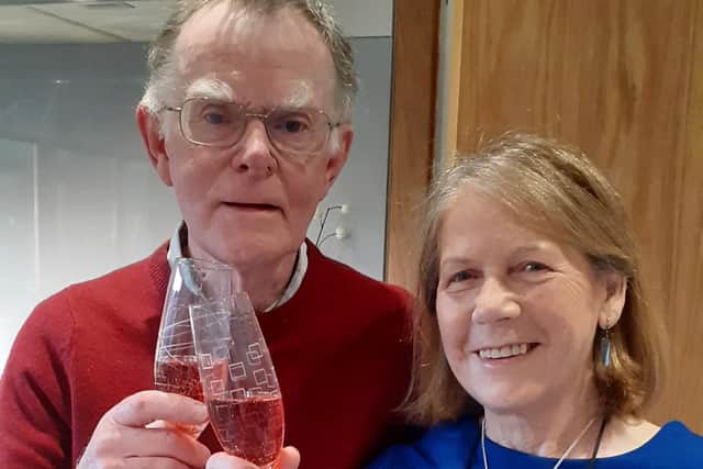 David and Christine Irvine enjoy a glass of champagne.