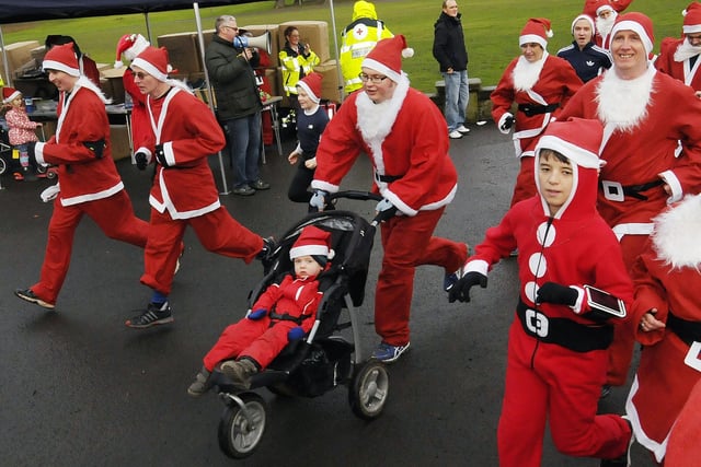 One Santa doing a bit of chauffeuring.