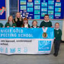 St Margaret's Primary is the only Falkirk area school to have been awarded a UNICEF Gold award as a Rights Respecting School for the third time.  Pictured is staff member Lisa Urbanowicz with some of the school's pupils.  Picture: Scott Louden.