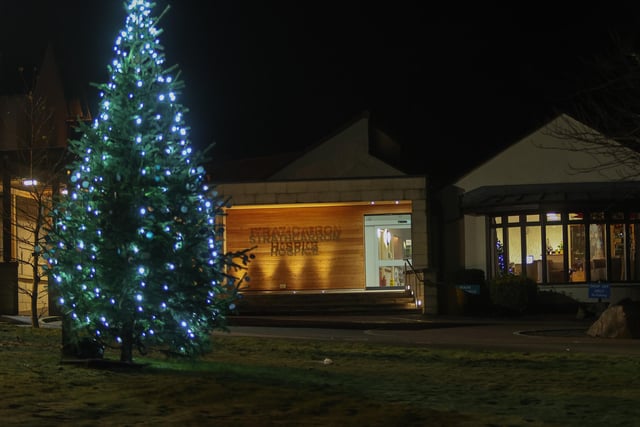 The tree stands in the grounds outside the entrance to the hospice.
