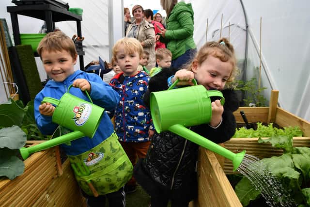Youngsters from Larbert and District Childminding Group have a small allotment in the church grounds - now more people are being encouraged to apply for their own space to grow fruit, veg and flowers. Pic: Michael Gillen