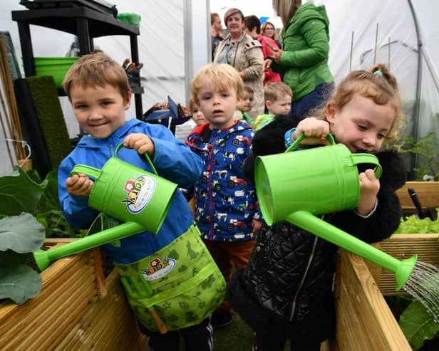 Youngsters from Larbert and District Childminding Group have a small allotment in the church grounds - now more people are being encouraged to apply for their own space to grow fruit, veg and flowers. Pic: Michael Gillen