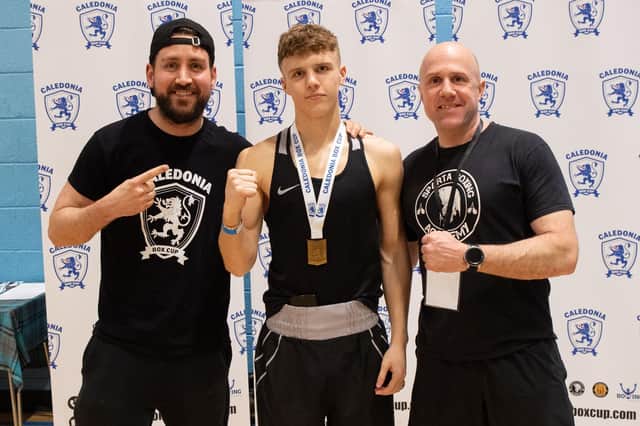 Head coach Sam McLeod, Thomas O’Reilly and his father John O’Reilly celebrating Thomas’s gold medal (photo: submitted)