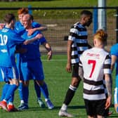 Devon Jacobs celebrates with team-mates after putting Bo'ness United 1-0 up (Pics by Scott Louden)