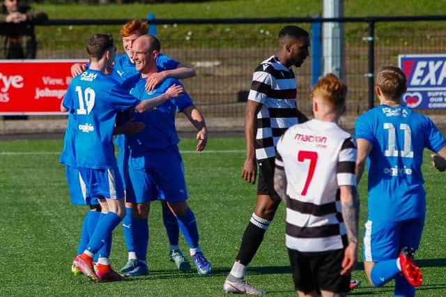 Devon Jacobs celebrates with team-mates after putting Bo'ness United 1-0 up (Pics by Scott Louden)