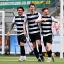 Midfielder Ynyr Liddell, right, celebrates scoring for East Stirlingshire against Gretna 2008 last Saturday during a 3-0 win for the home side with his team-mates (Pics by Michael Gillen)