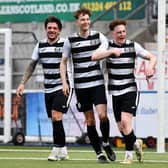 Midfielder Ynyr Liddell, right, celebrates scoring for East Stirlingshire against Gretna 2008 last Saturday during a 3-0 win for the home side with his team-mates (Pics by Michael Gillen)