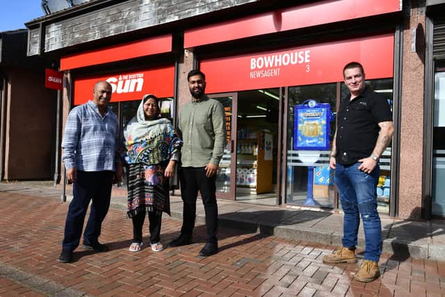 The Farid family, Ghulam, Shagufta and Zain, say goodbye to the Bowhouse Newsagents after 20 years and hand over the business to Barry Mitchell