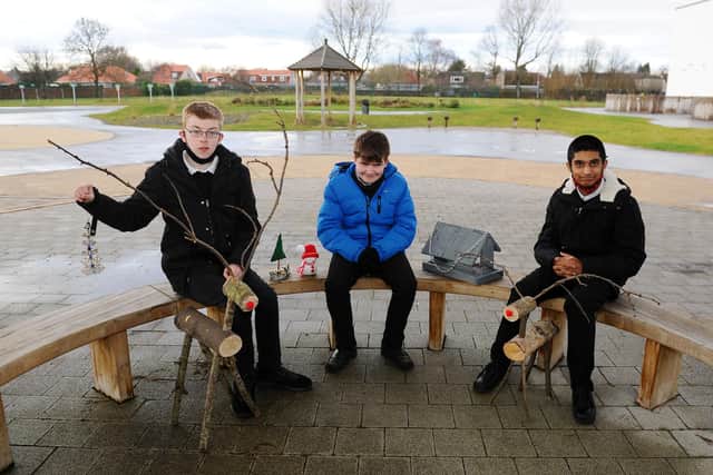 Carrongrange High pupils Jamie Connel, Argyle Howland and Humza Aamir with some of the gifts that feature in the school's Christmas catalogue. Picture: Michael Gillen.