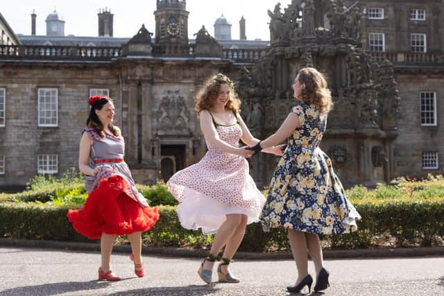 Holyrood Club dressed in 1950s clothes pose around Holyrood Palace,Edinburgh   Photograph: David Cheskin