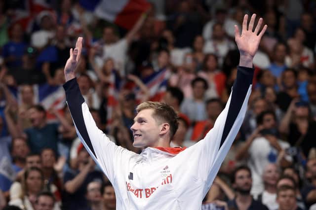 Former Bo’ness ASC and Grangemouth ASC youngster Duncan Scott celebrates on the podium (Photo: Sarah Stier/Getty Images)