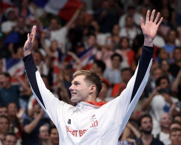 Former Bo’ness ASC and Grangemouth ASC youngster Duncan Scott celebrates on the podium (Photo: Sarah Stier/Getty Images)