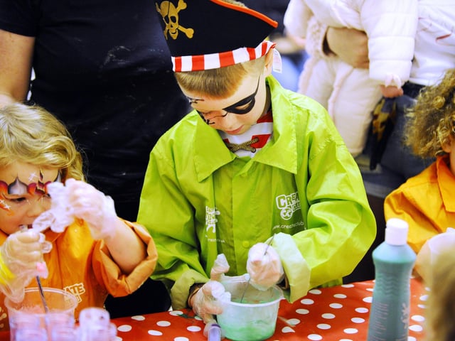 Enjoying the slime workshop.