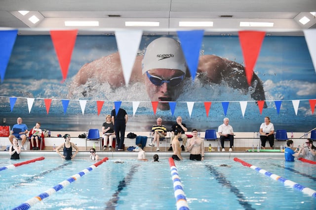 Olympic gold medallist Duncan Scott keeps an eye on procedings.