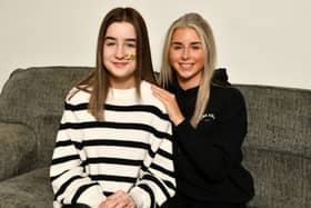 Emma Noble and twin sister Abbie who are fundraising for treatment in Germany for Emma's rare stomach complaint. Pic: Michael Gillen