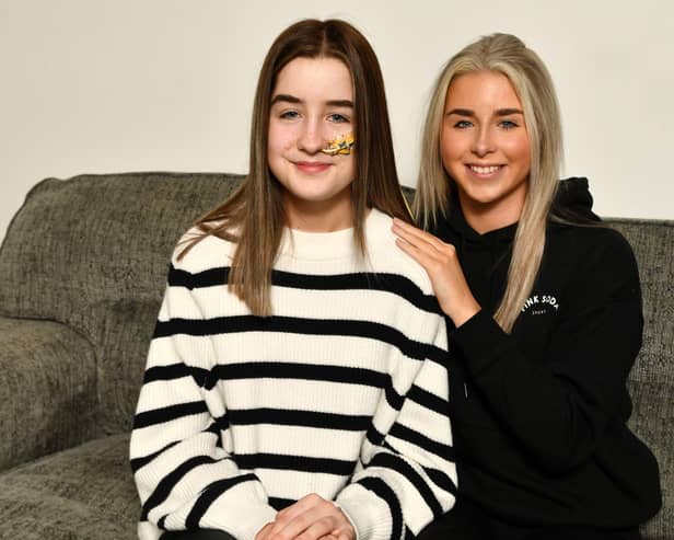 Emma Noble and twin sister Abbie who are fundraising for treatment in Germany for Emma's rare stomach complaint. Pic: Michael Gillen