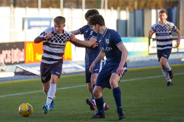 Kenny Barr looks to drive forward with the ball as Shire try to find an opener (Pictures: Scott Louden)