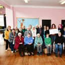 West Plean and Auchenbowie Ladies Club hand over cheque for £175 to Forth Valley Sensory Centre for BSL. Pic: Michael Gillen