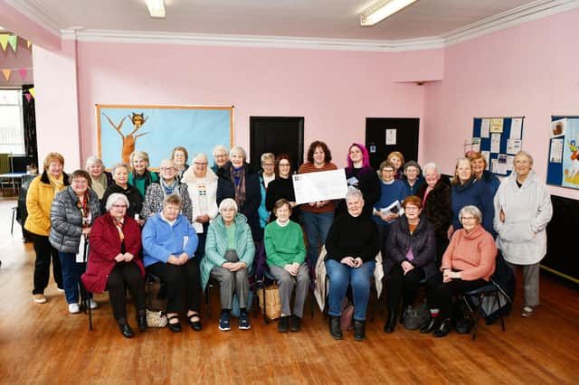 West Plean and Auchenbowie Ladies Club hand over cheque for £175 to Forth Valley Sensory Centre for BSL. Pic: Michael Gillen