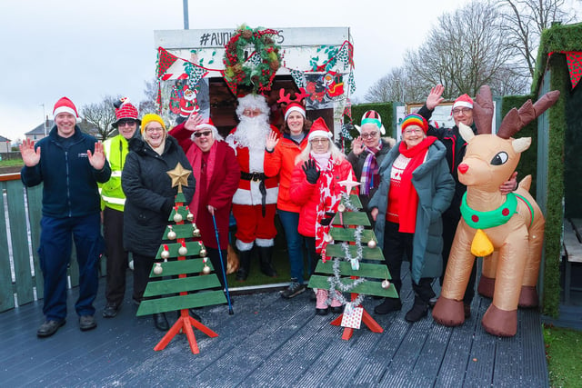The Go Forth and Clyde Santa event team with Councillor Cecil Meiklejohn