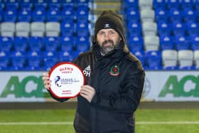 Hartley accepts SPFL 1 Manager of the Month trophy for December 2021 (Photo by Dave Cowe)