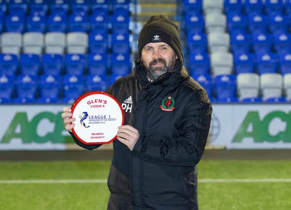 Hartley accepts SPFL 1 Manager of the Month trophy for December 2021 (Photo by Dave Cowe)