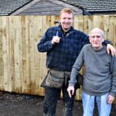 What a difference a week makes -  John McLay, of McLay's Fencing and Decking, takes half-a-day to build the fence ex service man Ian Wilson, 73, had been waiting on Falkirk Council to fix for an entire year
