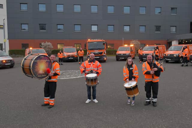 Pictured Scott McNeil, Ross McNeil, Donelsa McNeil and George McNeil, all of Denny and Dunipace Pipe Band, at Forth Valley Royal Hospital as RAC workers pay tribute to NHS staff. Picture: Michael Gillen.