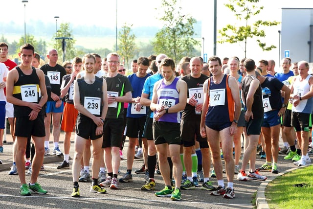 Runners prepare for the start of the race.