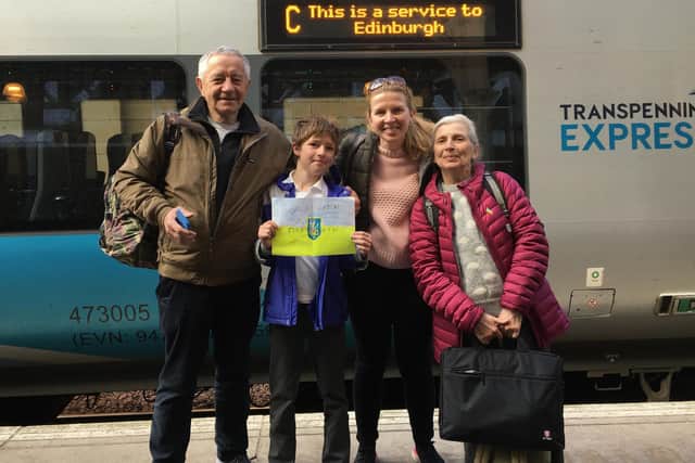 Anastasia Martin and her son Gregor welcomed Luda and Viktor at Waverley Station last week.