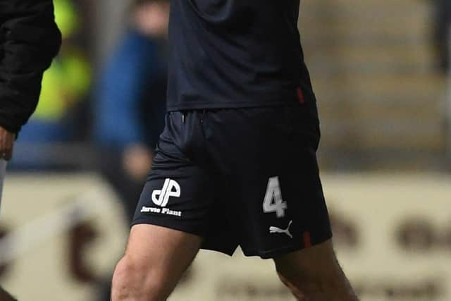 Captain Stephen McGinn applauds the Bairns support