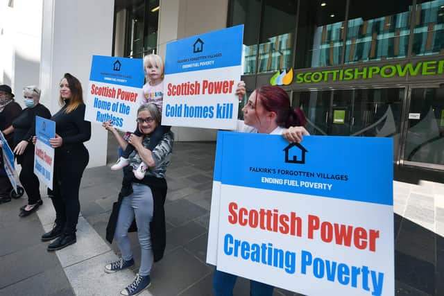 Members of Falkirk's Forgotten Villages - Ending Fuel Poverty campaign take their protest against Scottish Power to the company's Glasgow headquarters