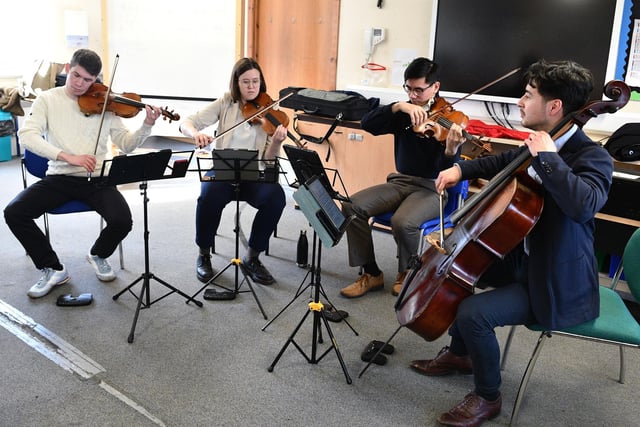 Resol String Quartet perform for the P7 pupils.