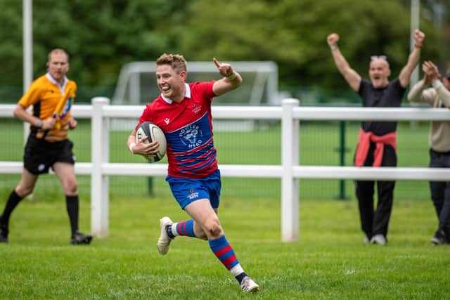 Falkirk captain Harry Russell celebrates scoring a try for Caledonia Reds in their Scottish rugby inter-district championship final (Pictures by Bryan Robertson)