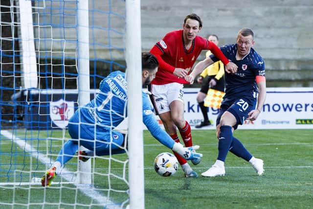 KIRKCALDY, SCOTLAND - JANUARY 25: Falkirk's Liam Henderson scores to make it 1-0 during a William Hill Championship match between Raith Rovers and Falkirk at Stark's Park, on January 25, 2025, in Kirkcaldy, Scotland. (Photo by Mark Scates / SNS Group)