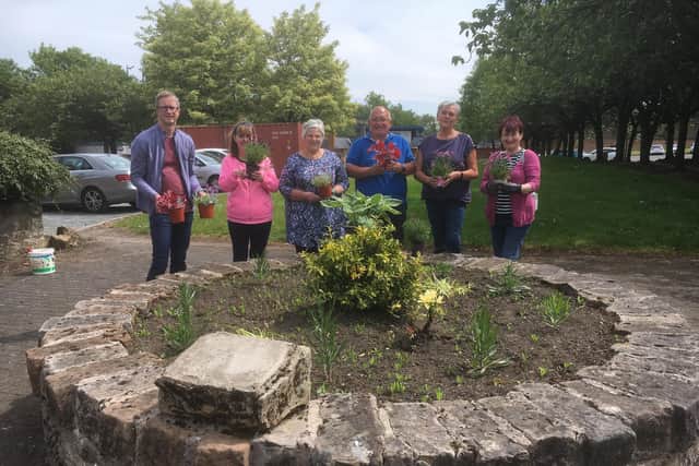 Members of the Hope Hub and Inspire Denny and Dunipace have teamed up to make the area look great for summer