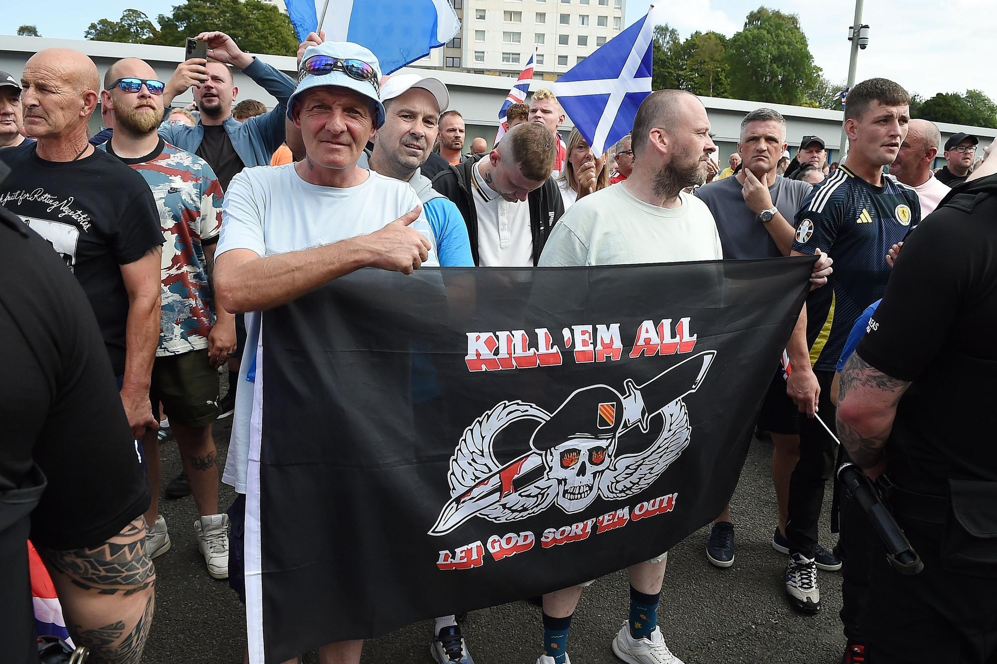 Protest In Falkirk Watch as protests take place at asylum seeker hotel in Falkirk town centre