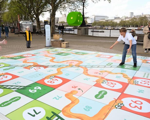 As part of Specsavers’ campaign to raise awareness of childhood myopia, and the benefits of spending time outdoors in the reducing the risk of developing the condition, a giant outdoor snakes and ladders installation appeared on London’s South Bank on Wednesday April 16.