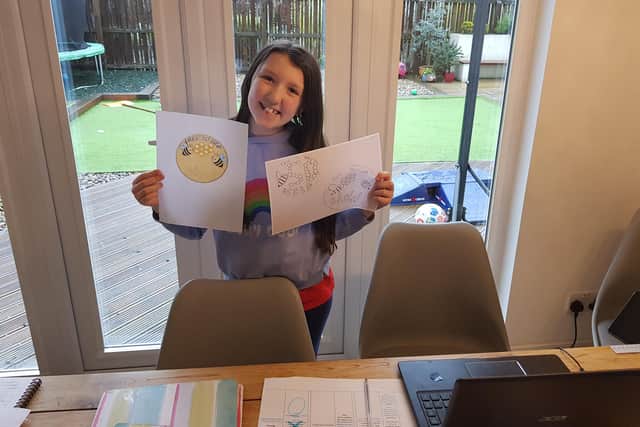 Larbert girl Millie Blair celebrates winning Bield Housing and Care's 50th anniversary design contest. Contributed.