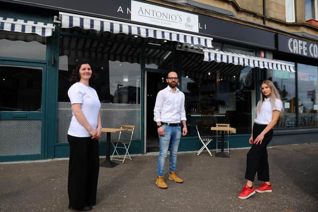 Antonio's Deli staff Alina Ionescu, Andrea Risiglione and Natalia Bator are preparing to reopen the Falkirk shop on Thursday, when customers will be able to settle their bill using cryptocurrency. Picture: Michael Gillen.