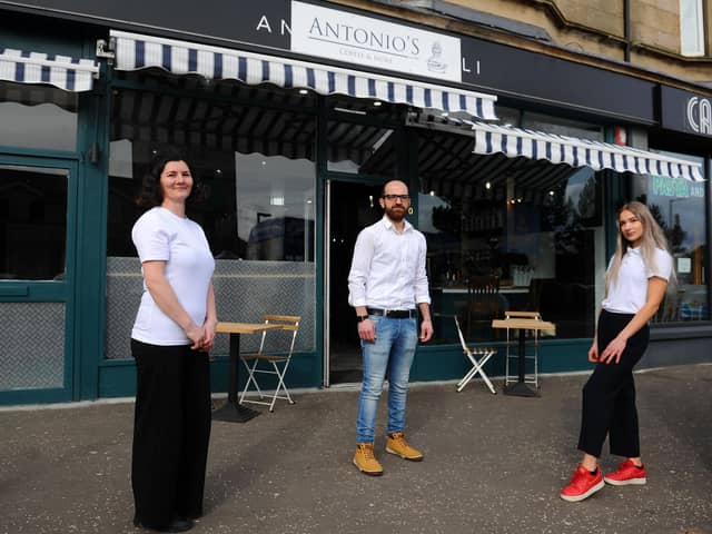 Antonio's Deli staff Alina Ionescu, Andrea Risiglione and Natalia Bator are preparing to reopen the Falkirk shop on Thursday, when customers will be able to settle their bill using cryptocurrency. Picture: Michael Gillen.