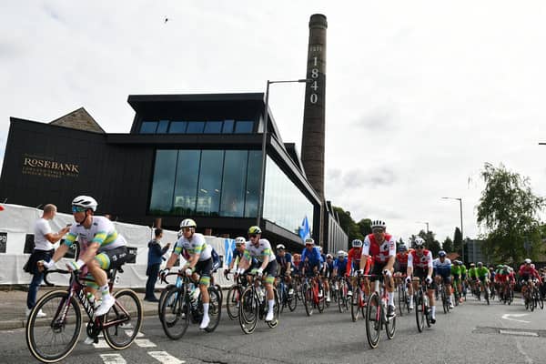 Cyclists passing the Rosebank Distillery. Pic: Michael Gillen