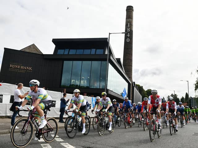 Cyclists passing the Rosebank Distillery. Pic: Michael Gillen