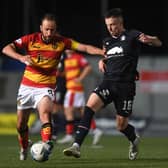 Gary Oliver (right) scored clincher against Partick (Pic by Craig Foy/SNS)