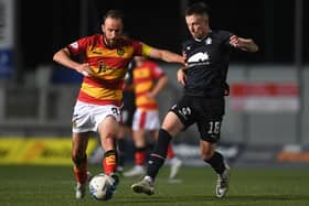 Gary Oliver (right) scored clincher against Partick (Pic by Craig Foy/SNS)